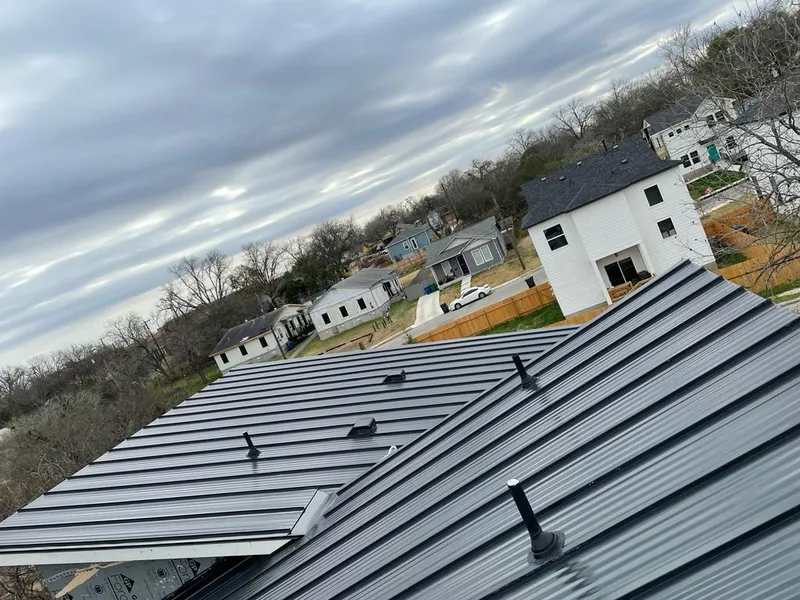 Standing seam metal roof panels with vents for Skylight Repair in Oshtemo